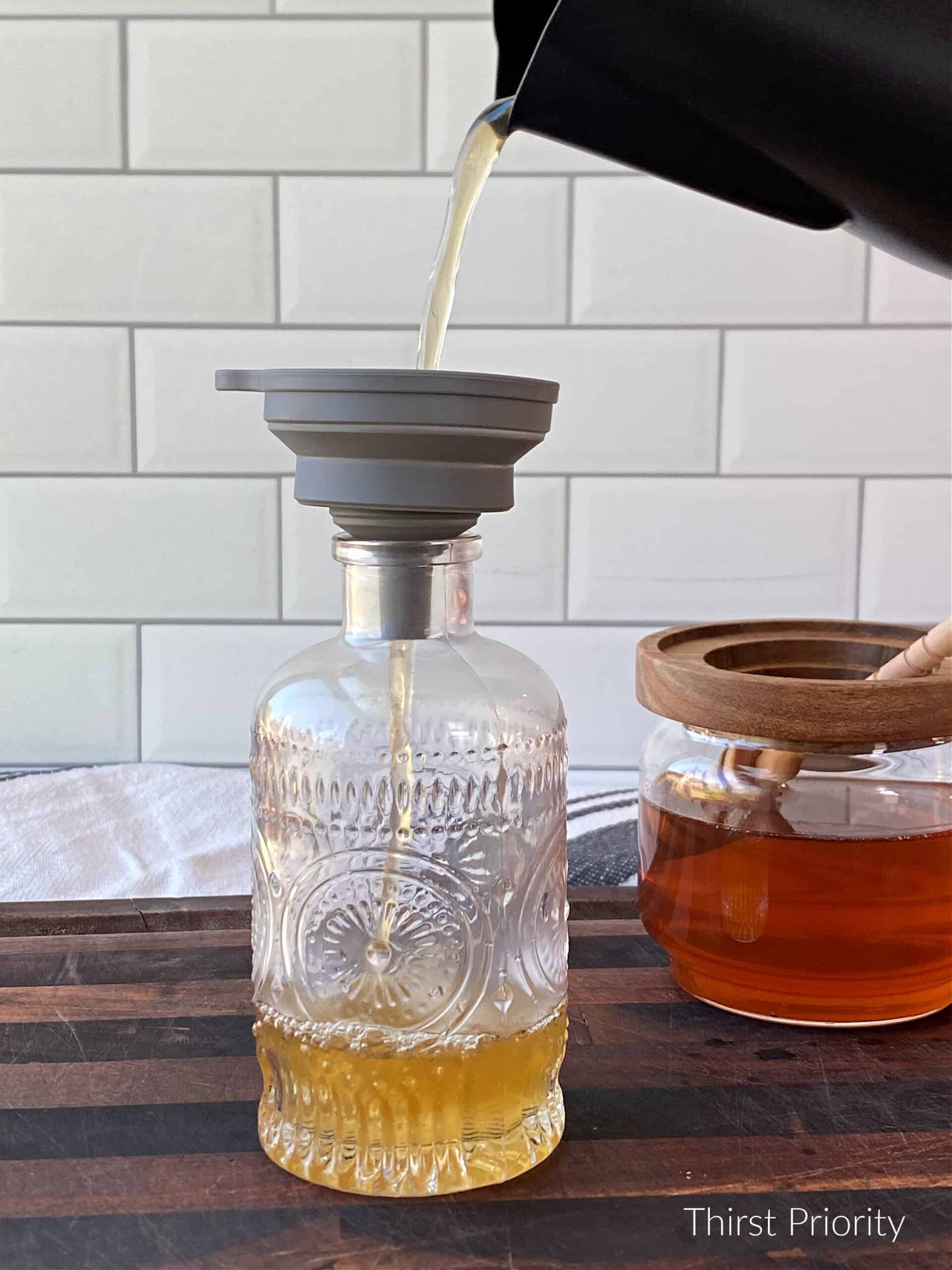 natural sweetener syrup into glass bottle